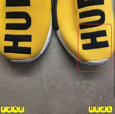 adidas human race nmd real vs fake size tag|are nmd shoes real.